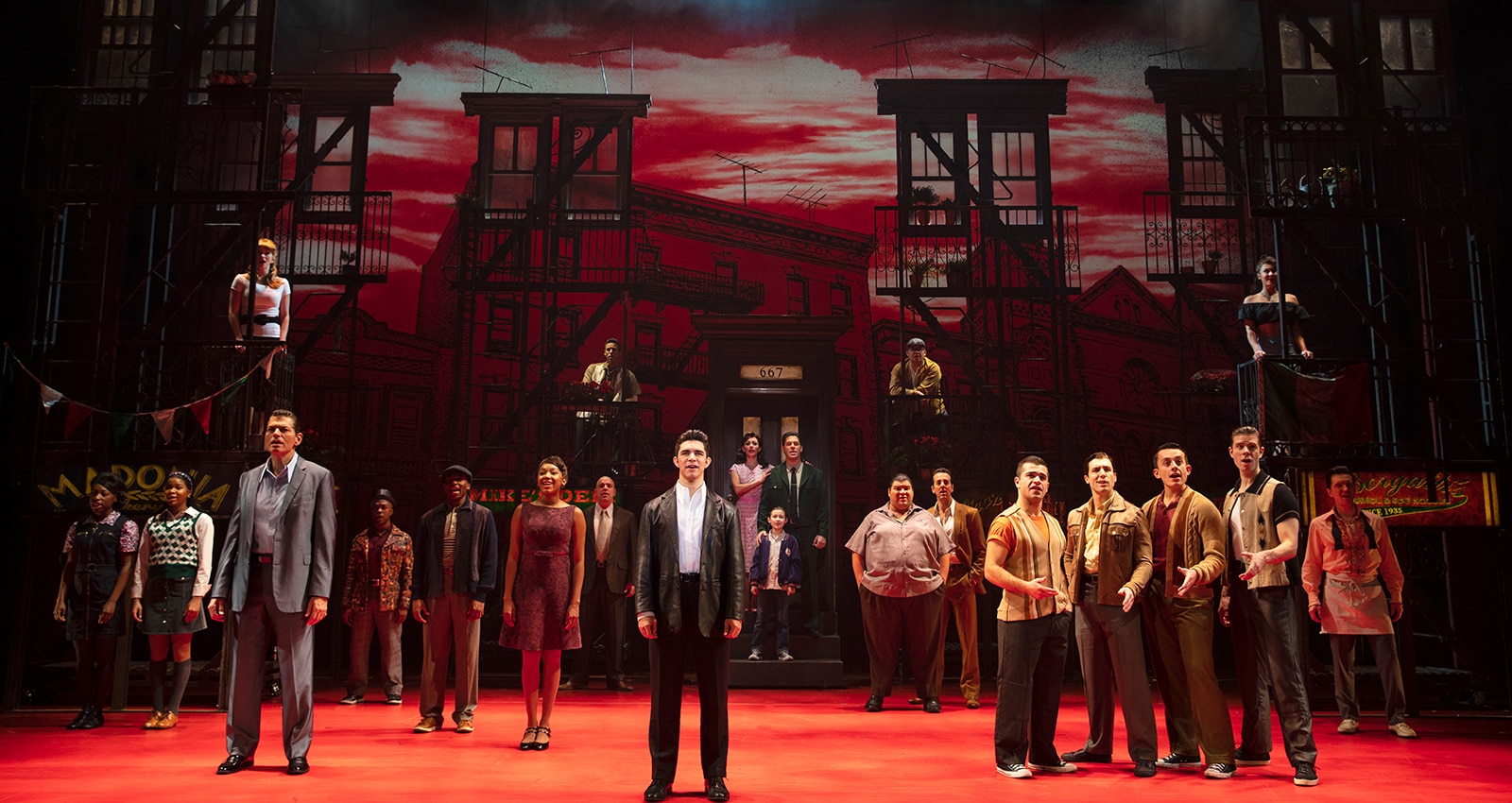 Joe Barbara (Sonny, left) and Joey Barreiro (Calogero, center), with the Touring Company of A BRONX TALE Photo: Joan Marcus