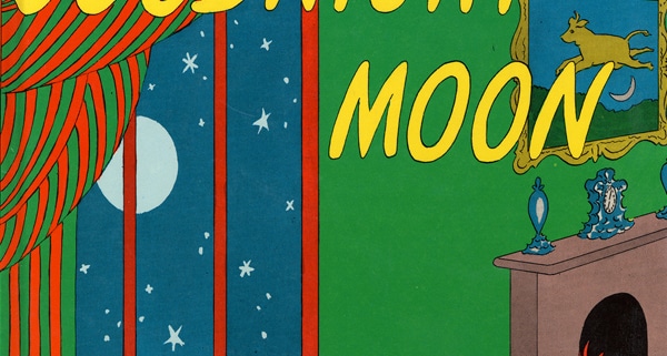 Illustration of a room with a window showing the night sky, a fireplace, and the text 'GOODNIGHT MOON' in large yellow letters.