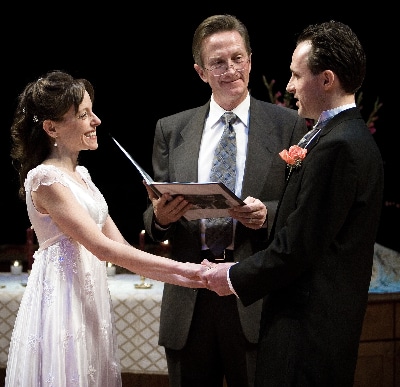 Jamie Horton, center, officiated the wedding of Douglas Harmsen and Stephanie Cozart on the Stage Theatre in 2006.