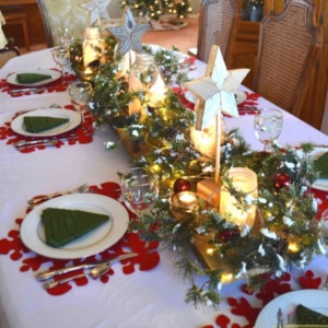 A brightly decorated, Christmas themed dining table