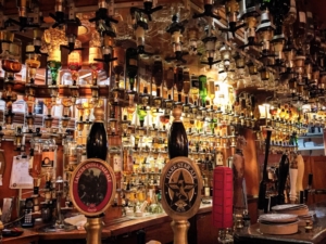 Pints Pub, Photo of a bar and numerous whiskey and scotch bottles