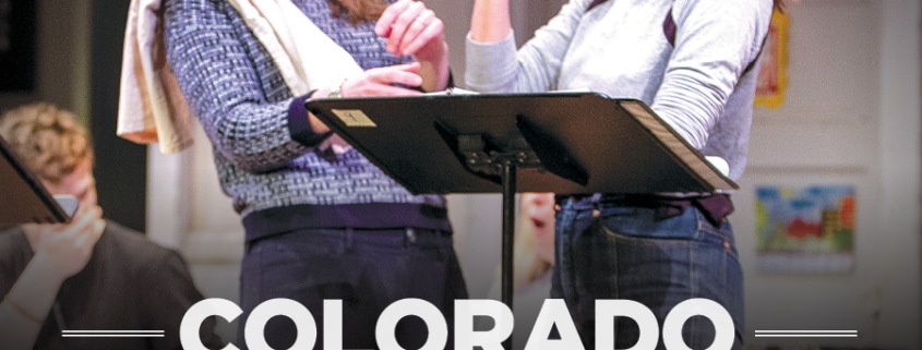 Colorado New Play Summit image of two women laughing and acting out lines while reading