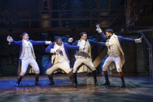 the company of Hamilton Broadway Tour dances onstage