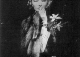 black and white photograph of Betty Pack, codename Cynthia, holding a finger to her lips