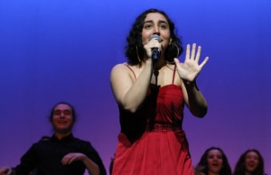 A singer performs onstage at the DCPA Bobby G Awards