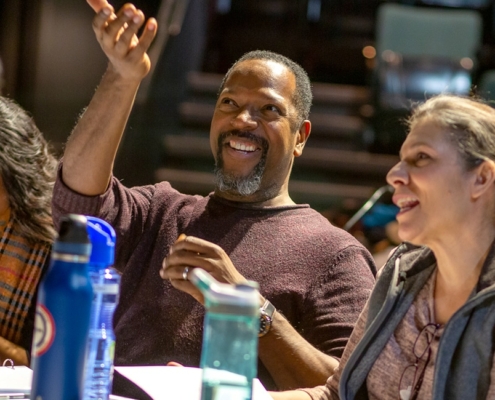 Participants in the Colorado New Play Summit sit at a table