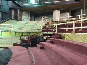 Risers in the audience of a deconstructed theatre