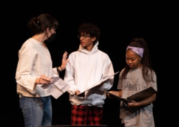 Director of Education Allison Watrous works with the cast of They Stole the Moon by Ricardo D'Urso