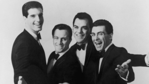 The Four Seasons pose for a black and white photo