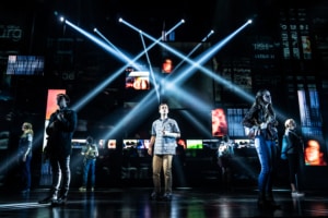 The cast of Dear Evan Hansen stands onstage