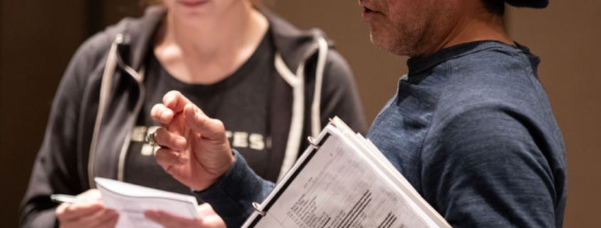 Actors listen intently as their DCPA Education instructor speaks