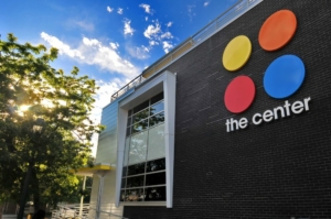 Exterior of The Center with a blue sky in the background