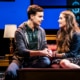 Evan Hansen sits on a bed with Zoe Murphy in Dear Evan Hansen