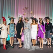 The winners of the Women with Hattitude runway show pose for a photo