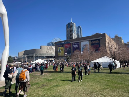 Smatterings of people in the park outside the Performing Arts Complex