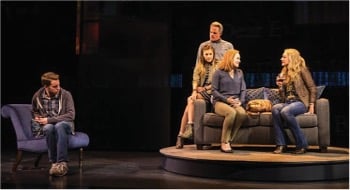 A group of actors sit on couches in Dear Evan Hansen