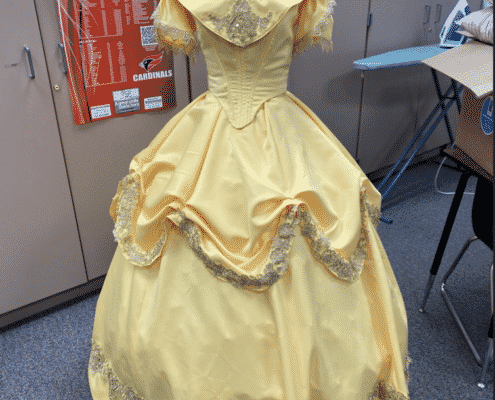 A costume for Belle's ballgown on a mannequin