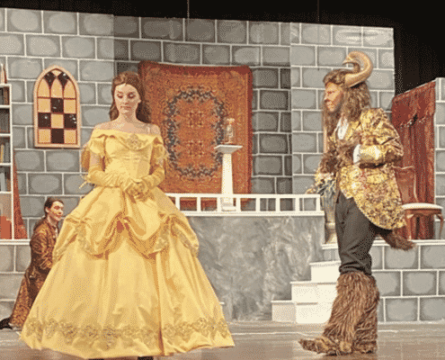 Belle and the Beast onstage in Beauty and the Beast