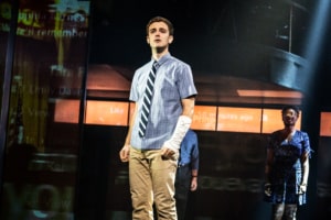 Evan Hansen sings onstage in Dear Evan Hansen