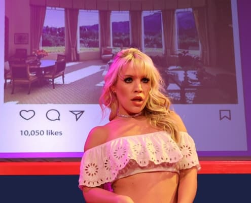 Actress playing Britney Spears stands in front of an instagram screenshot