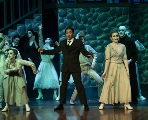 The Addams Family dances onstage