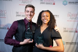 Thomas Beeker and Madison Manning pose with their awards