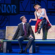 Vivian and Edward sit on a bench in Pretty Woman: The Musical