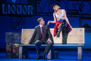 Vivian and Edward sit on a bench in Pretty Woman: The Musical