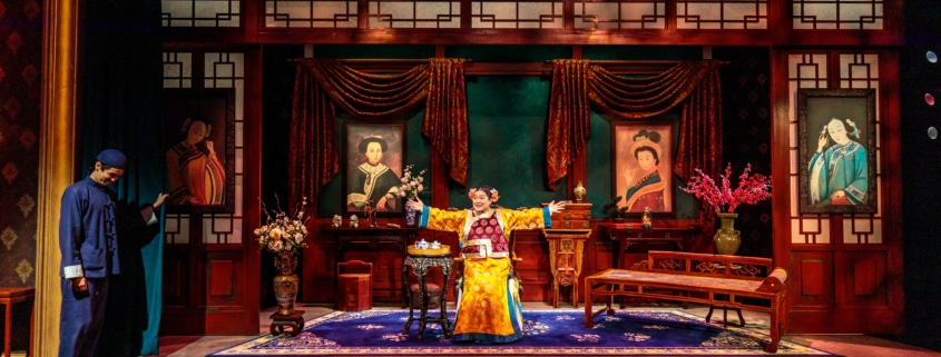 The cast of The Chinese Lady performs on an opulent stage