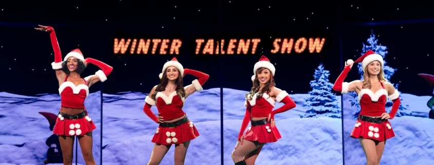 The cast of Mean Girls poses in Christmas themed costumes