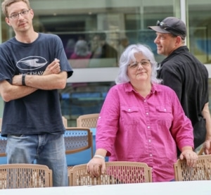 A group of people stand together at an event