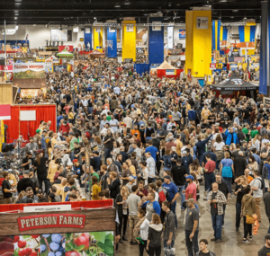 Hundreds of people mill about the Great American Beer Festival