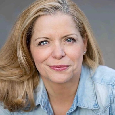 Headshot of KATE GLEASON