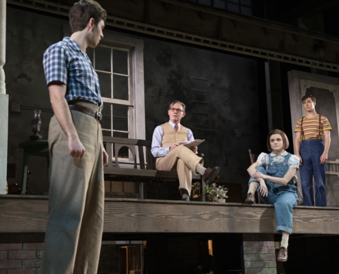 Justin Mark (Jem Finch), Richard Thomas (Atticus Finch), Melanie Moore (Scout Finch) and Steven Lee Johnson (Dill Harris) act out a scene on a typical Southern-style front porch