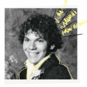 A headshot of young Casey Nicholaw