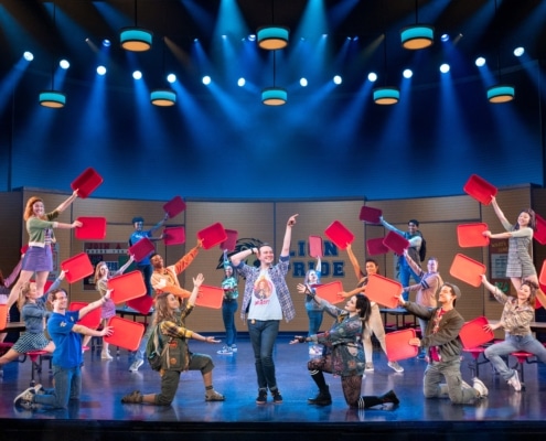 Pictured (L-R): Eric Huffman (Damian Hubbard) and the National Touring Company of Mean Girls Credit: © 2022 Jenny Anderson