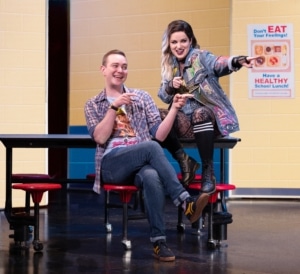 Pictured (L-R): Eric Huffman (Damian Hubbard) and Lindsay Heather Pearce (Janis Sarkisian) Credit: © 2022 Jenny Anderson