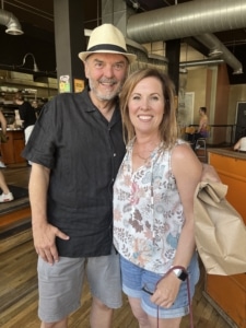 Kirk Petersen and Suzanne Yoe pose for a photo