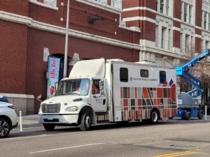 A large semi truck called the Bookmobile outside the DCPA