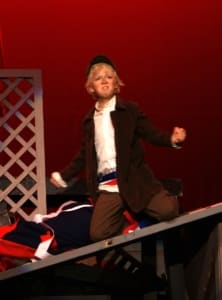 A young Erik Peterson as Gavroche in Les Mis