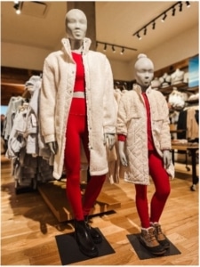 A woman and young girl mannequins wearing matching outfits in Athleta