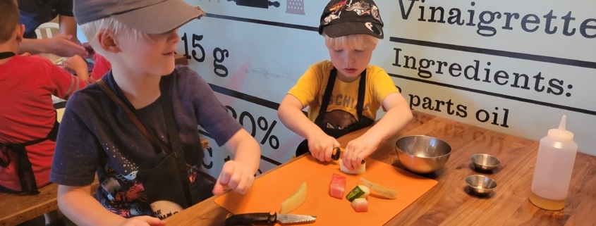 Children playing at the Children's Museum kitchen