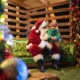 A child sits on Santa's lap at Camp Christmas