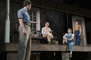 The Finch family and Dill Harris hang out on their front porch in To Kill a Mockingbird