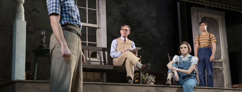 The Finch family and Dill Harris hang out on their front porch in To Kill a Mockingbird