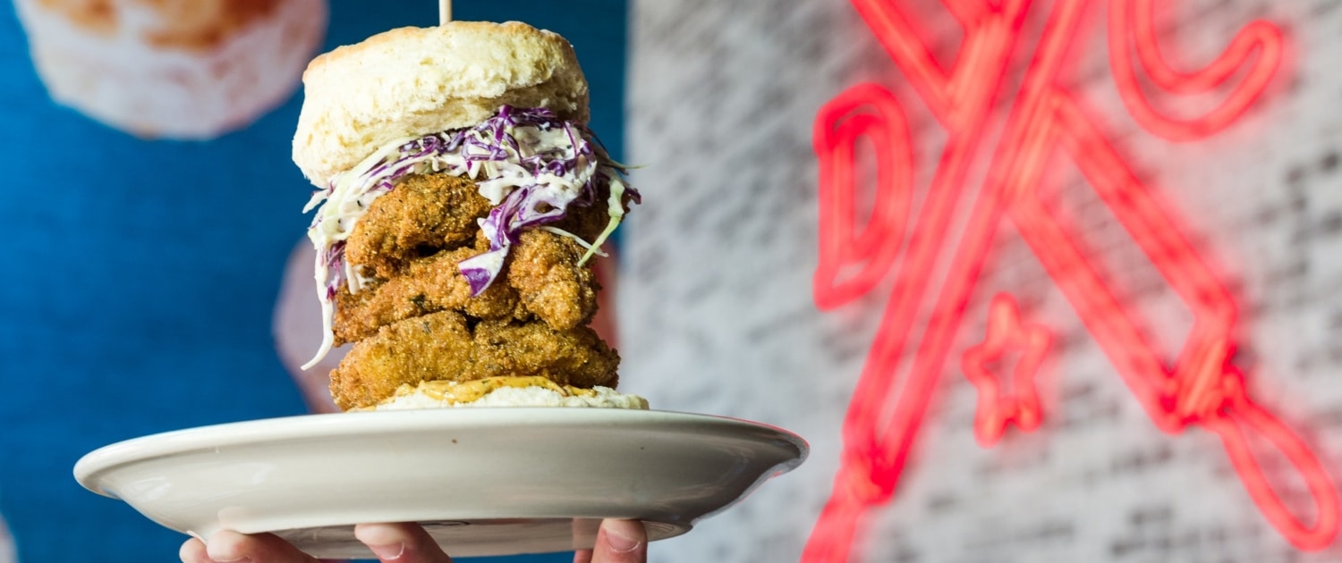 A towering biscuit sandwich and Denver Biscuit Company