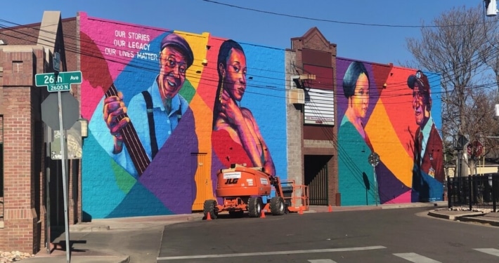 A colorful mural in the Five Points Plaza