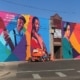 A colorful mural in the Five Points Plaza