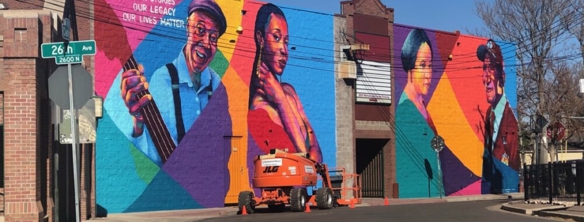 A colorful mural in the Five Points Plaza