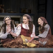 Chava, Tzeitel, and Hodel sit on the floor together in Fiddler on the Roof